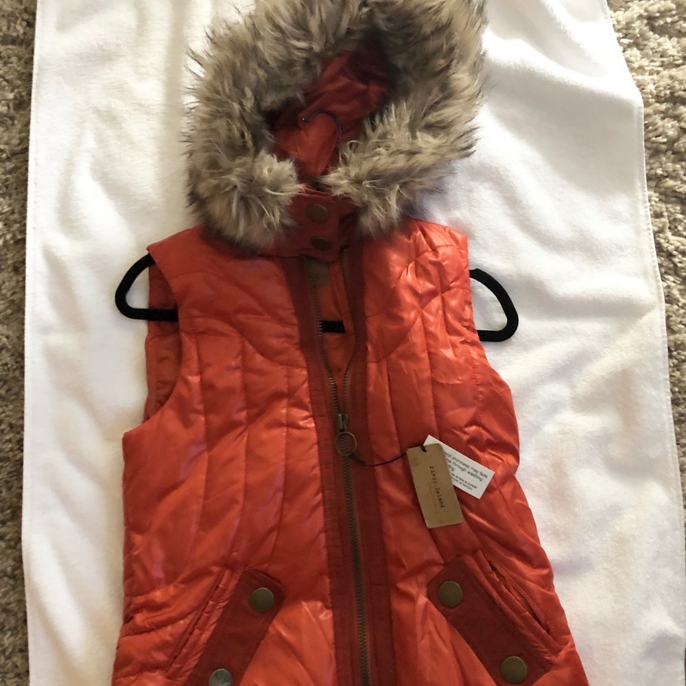 Faux fur hooded vest. NWT! Fits size 8
